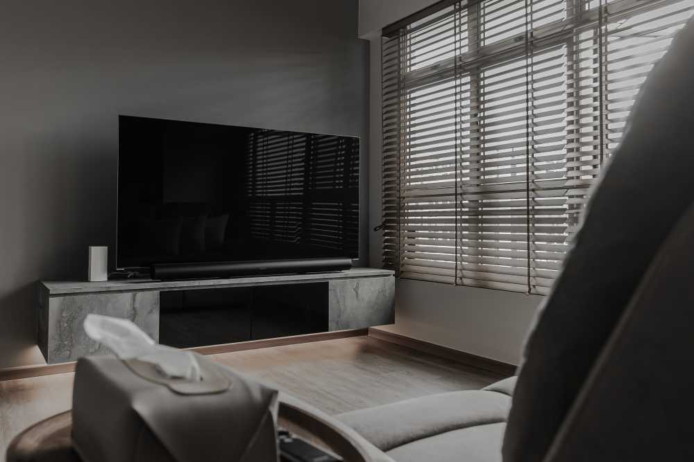 Modern Living Room with TV Console and Cove Lighting