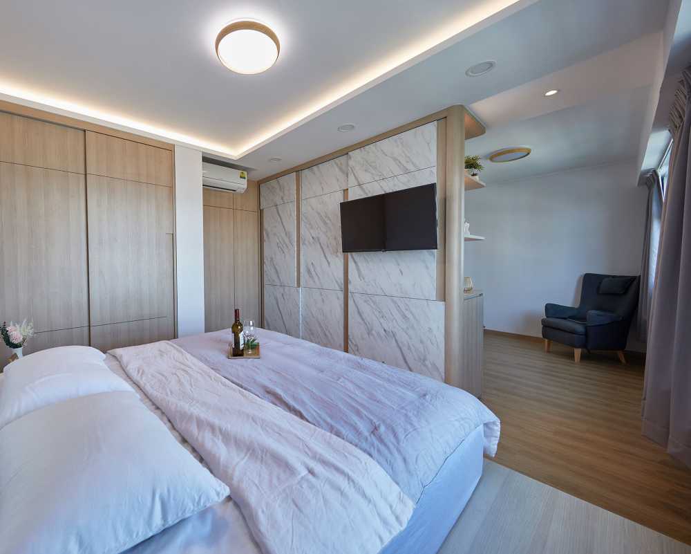 Scandinavian Bedroom with Granite Floor and Cove Lighting