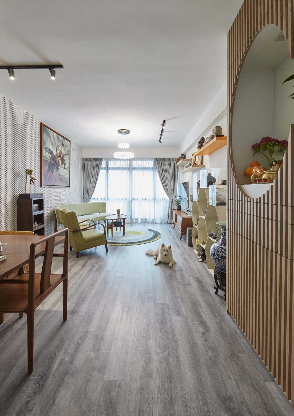 Scandinavian Living Room with Feature Wall and Chandelier