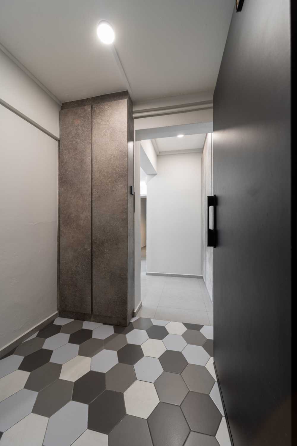 Contemporary Entryway with Shoe Cabinets and Tiles