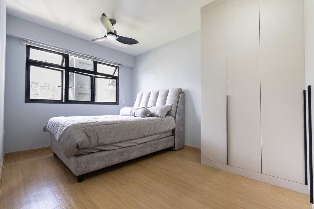 Minimalist Bedroom with Vinyl Flooring and Bay Window