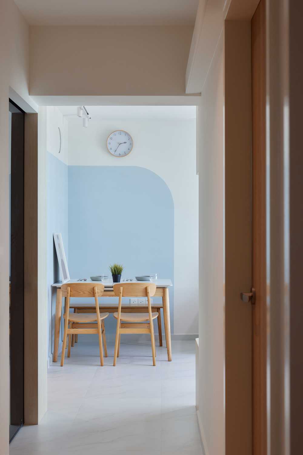 Scandinavian Hallway with Artwork and Paintings