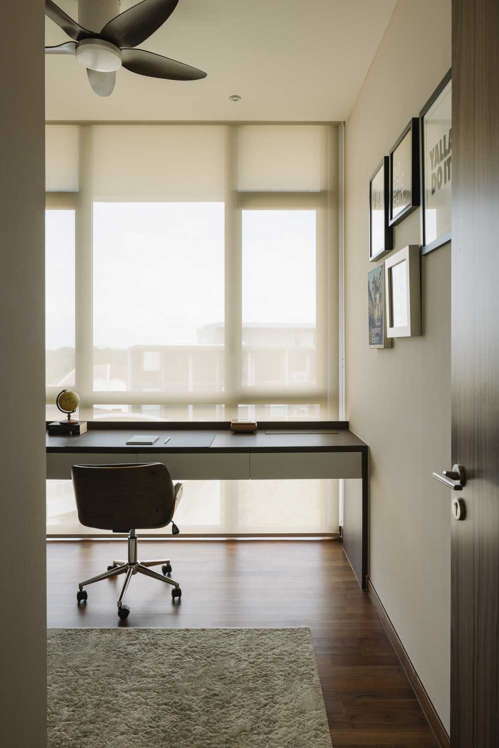 Modern Home Office with Artwork and Carpet