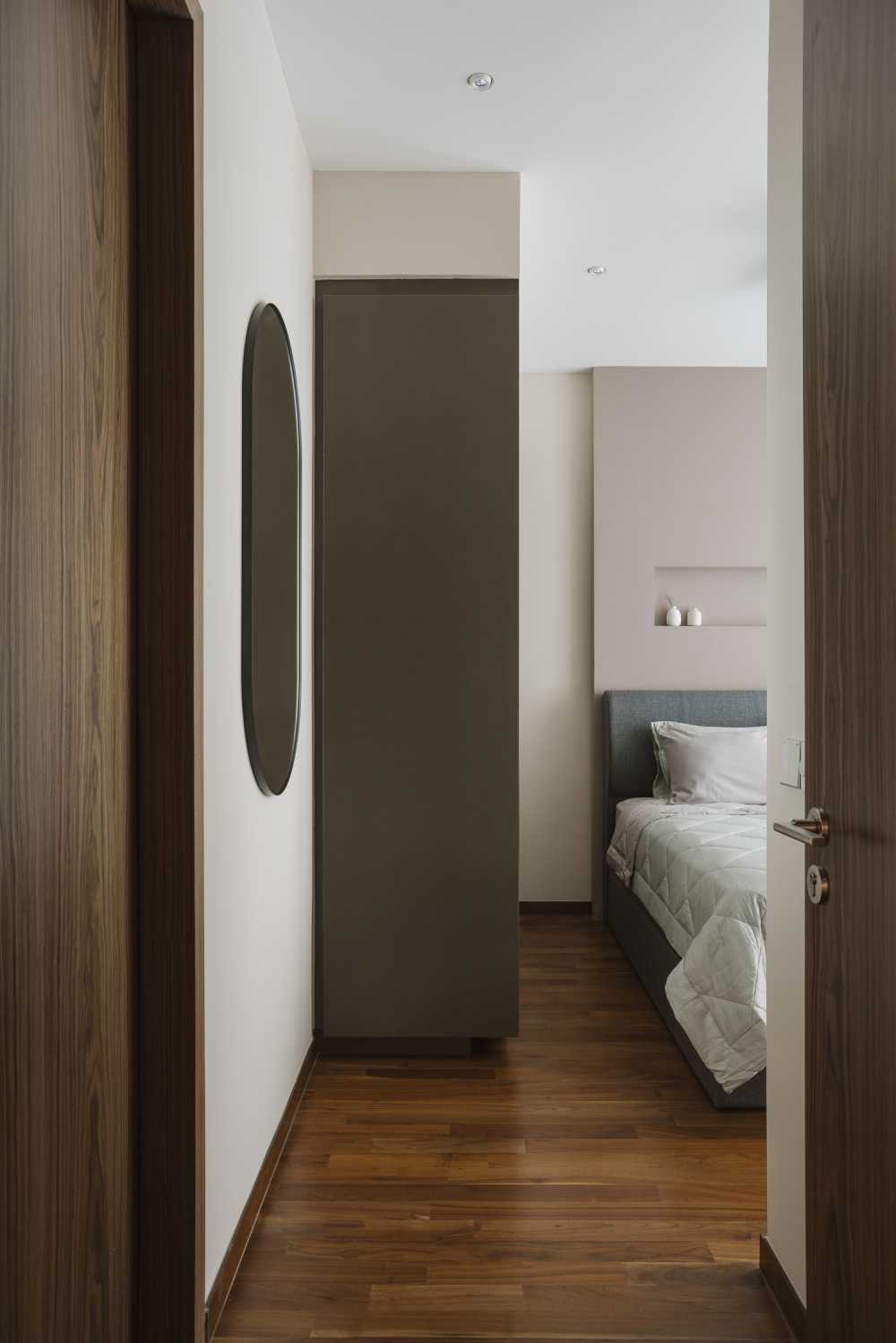 Modern Bedroom with Parquet Floor and Mirror