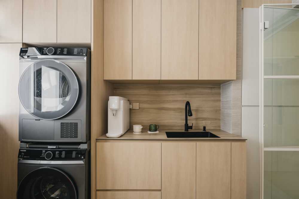 Modern Kitchen with Washing Machine and Cupboard