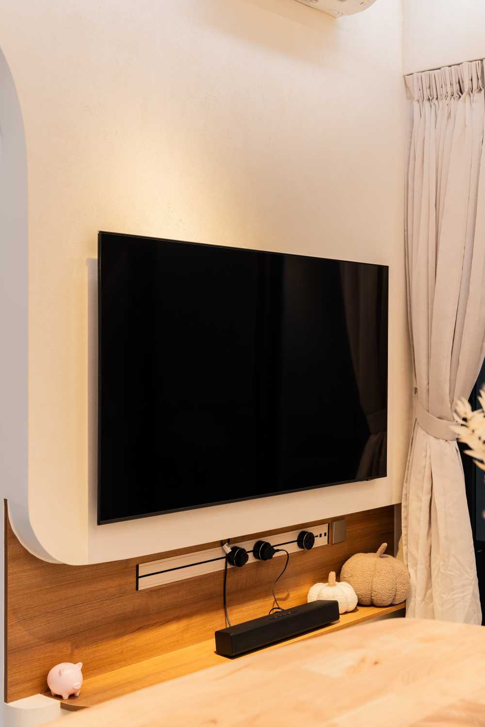 Contemporary Living Room with Feature Wall and Cove Lighting
