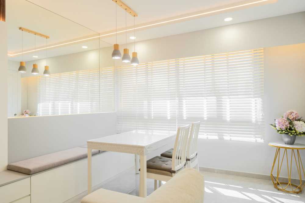 Modern Dining Room with Drop Light and Downlights