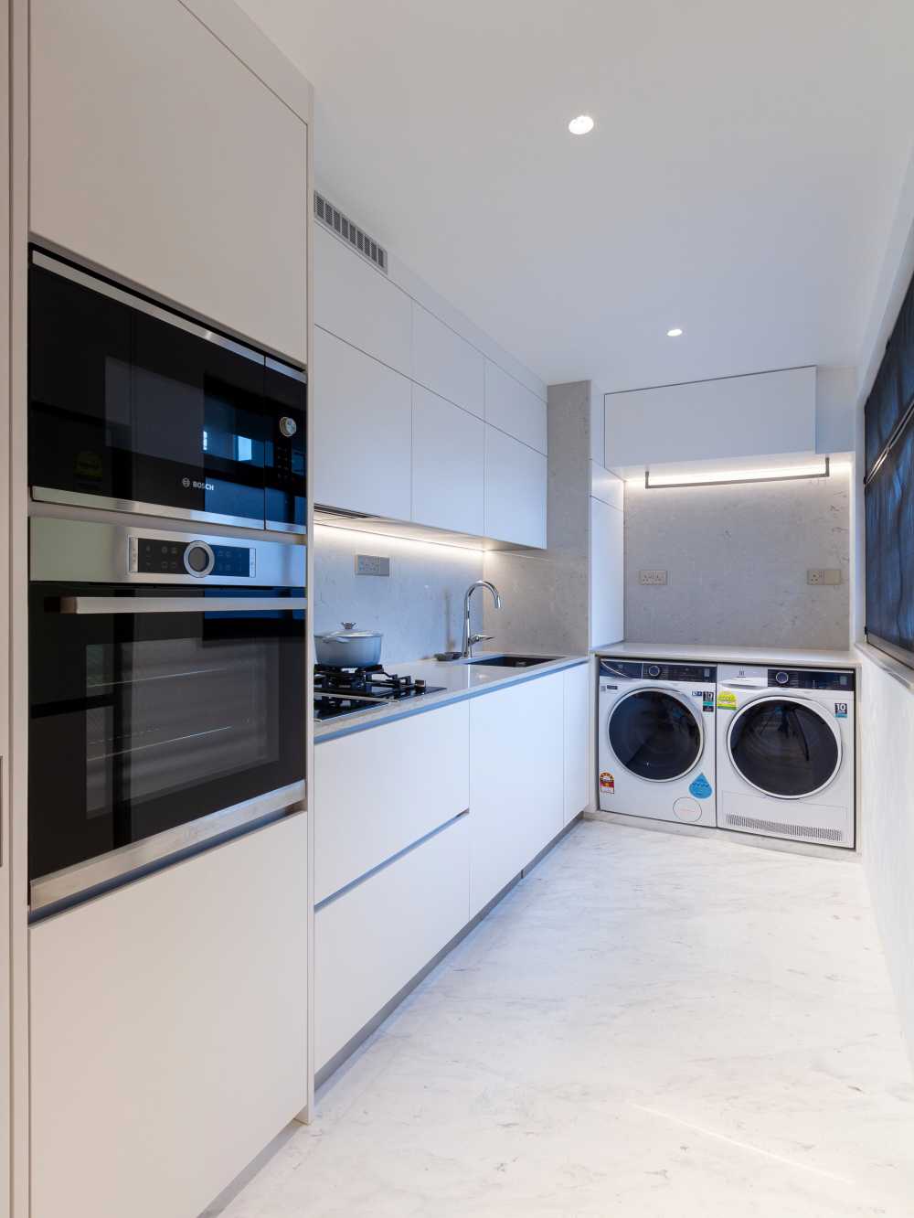 Minimalist Kitchen with Countertop and Homogeneous Tiles