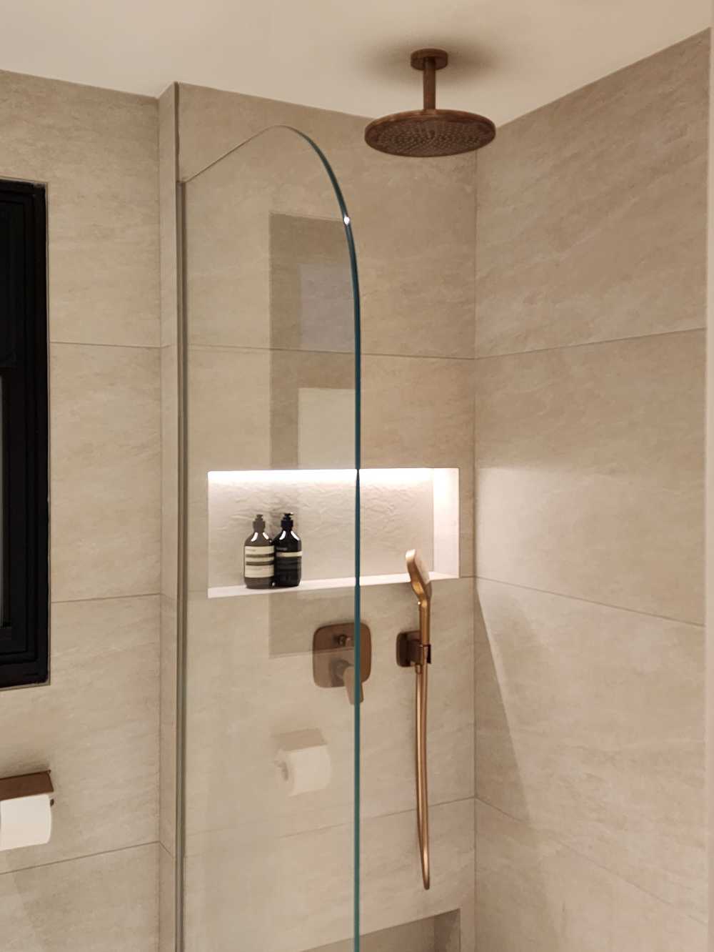 Minimalist Bathroom with Mirror and Showers