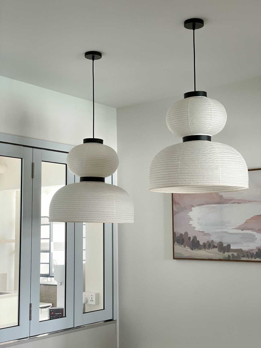 Minimalist Dining Room with Drop Light and Lighting
