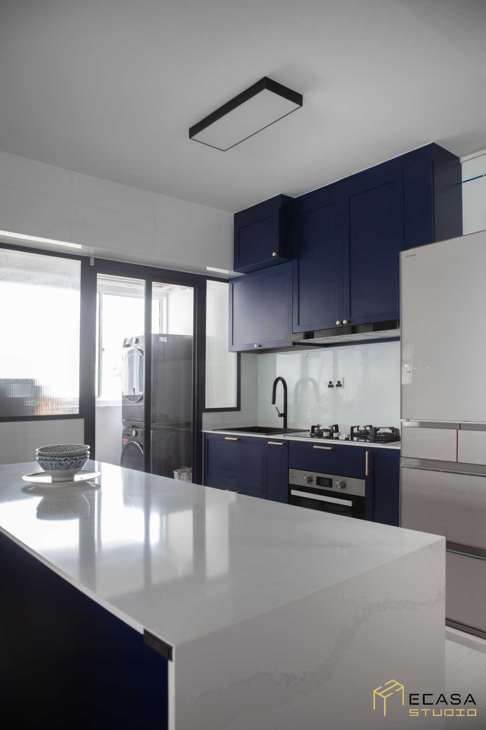 Modern Dining Room with Ceiling Light and Tableware
