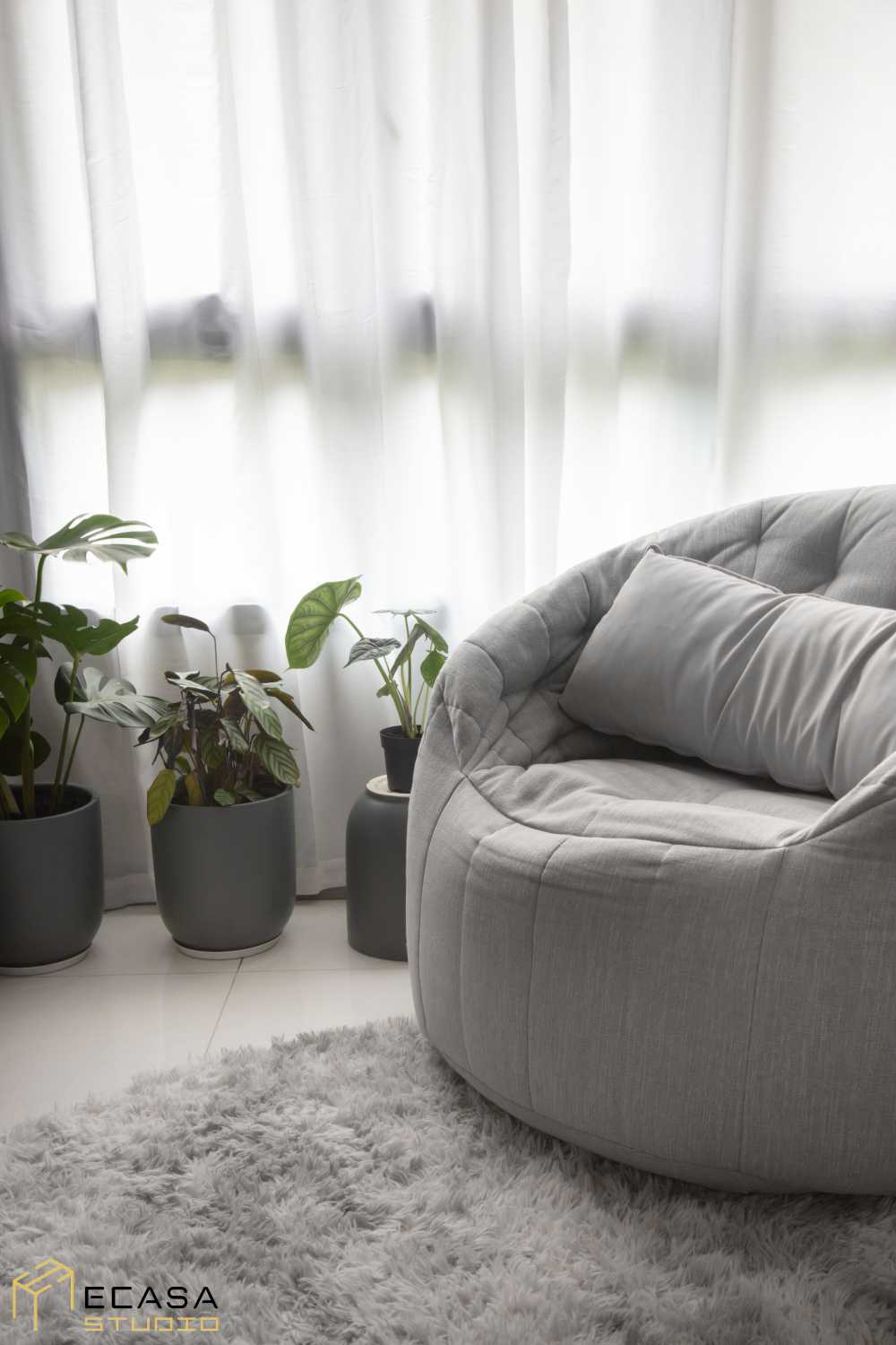 Modern Living Room with Cement Floor and Carpet