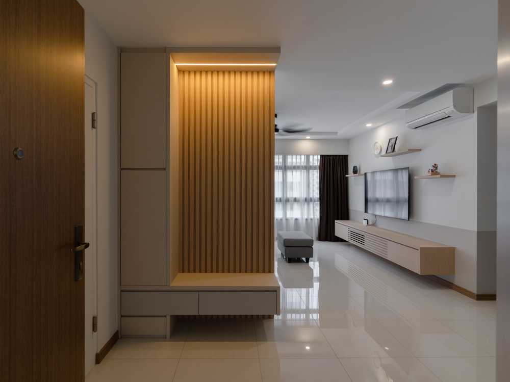 Scandinavian Foyer with Artwork and Small Storage