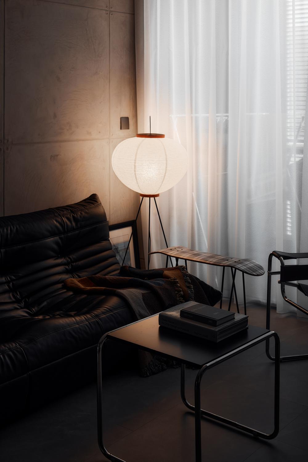Industrial Living Room with Feature Wall and Drop Light