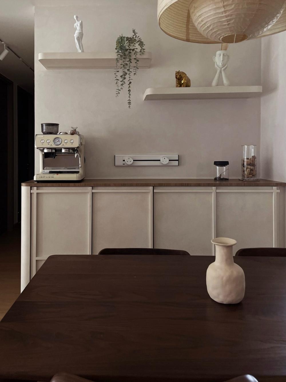 Scandinavian Dining Room with Feature Wall and Ceiling Light