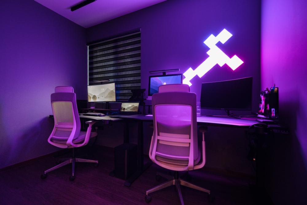 Modern Gaming Room with Desk Chairs and Computer