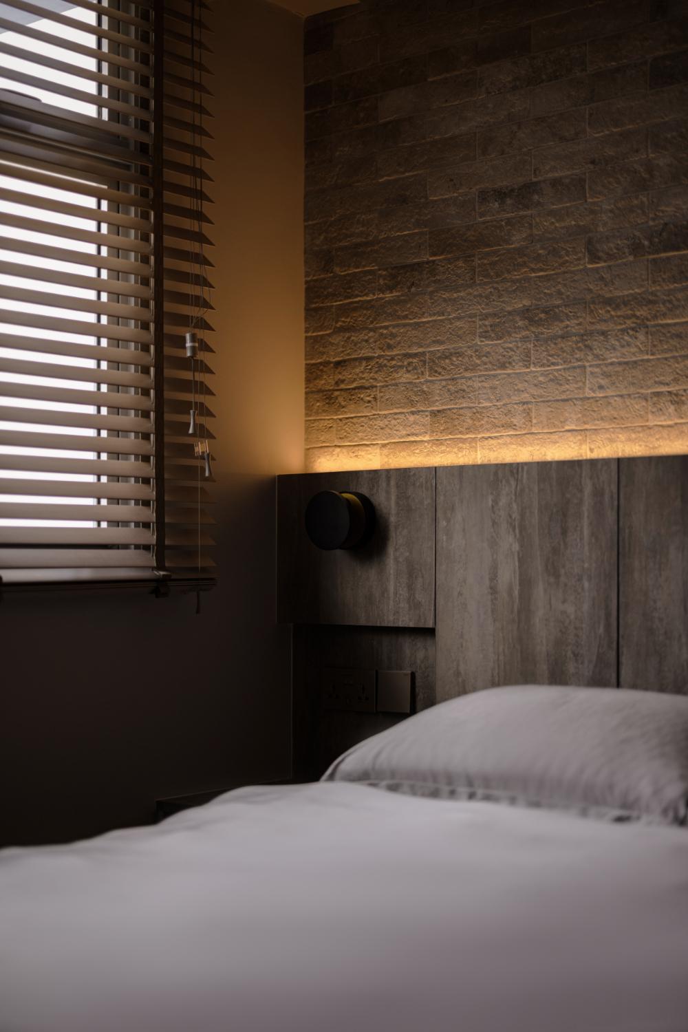 Country Bedroom with Feature Wall and Bedside Table