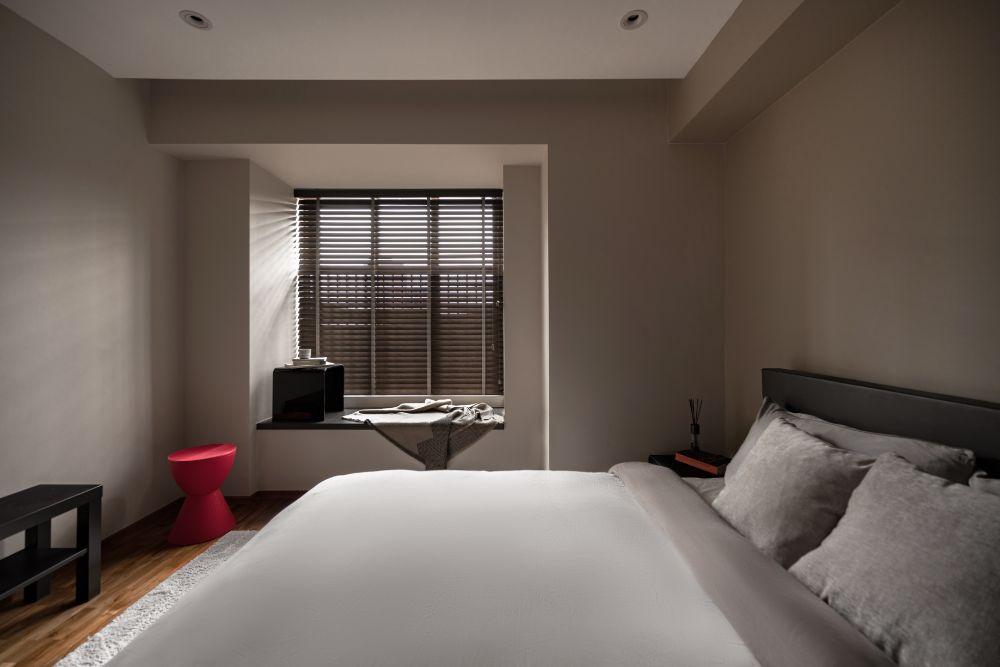 Modern Bedroom with Window Seat and Bedside Table