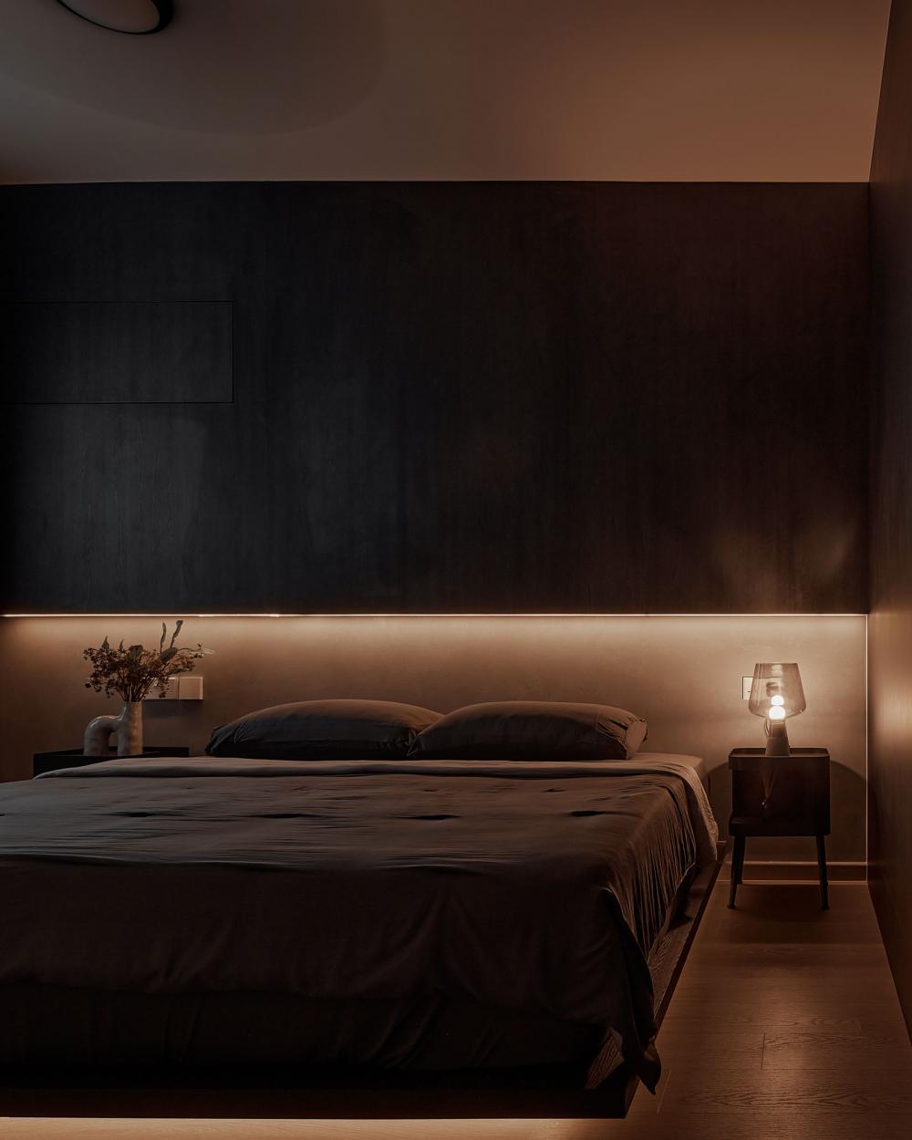 Contemporary Bedroom with Cove Lighting and Bedside Table