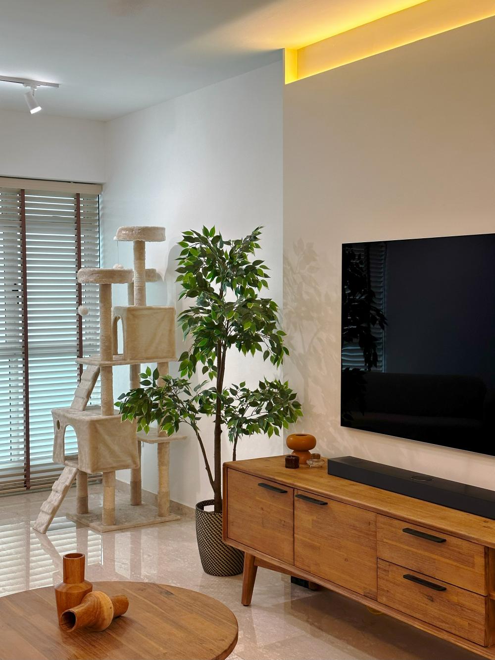 Scandinavian Living Room with Homogeneous Tiles and TV Console