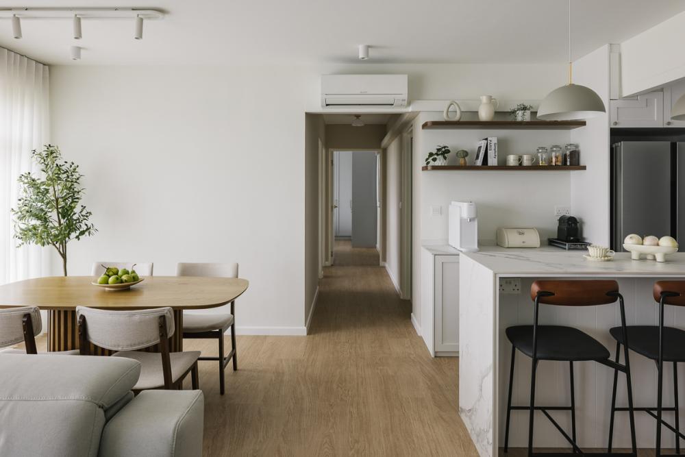 Modern Hallway with Kitchen Island and Dining Table