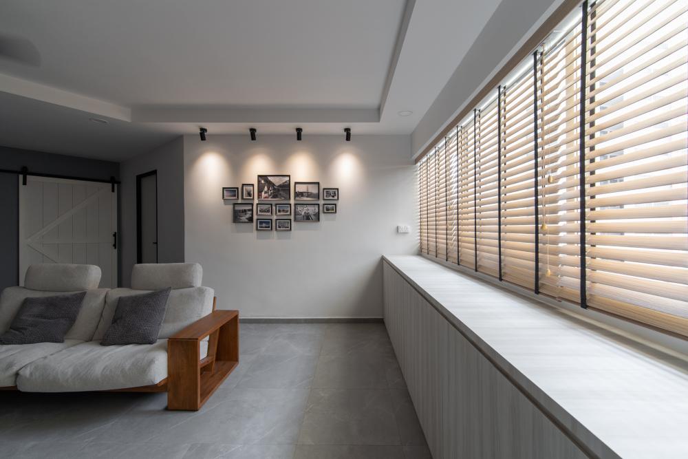 Scandinavian Living Room with Homogeneous Tiles and Sofa