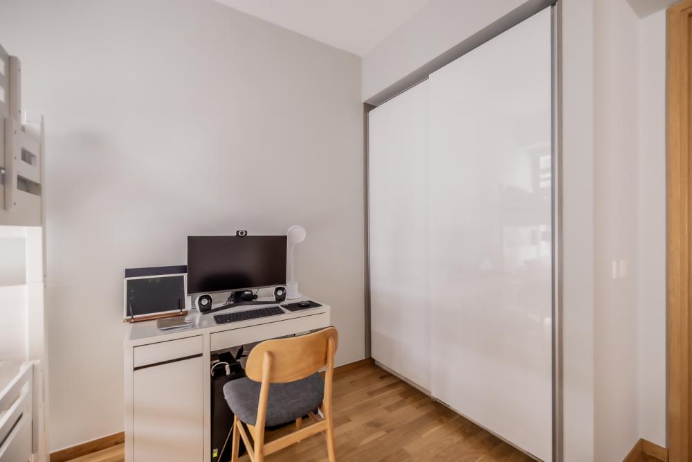 Minimalist Bedroom with Parquet Floor and Wardrobe