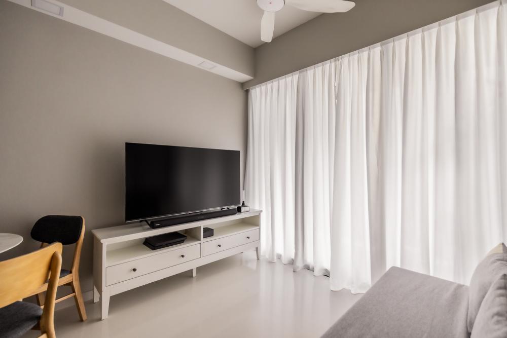 Minimalist Living Room with Homogeneous Tiles and TV Console