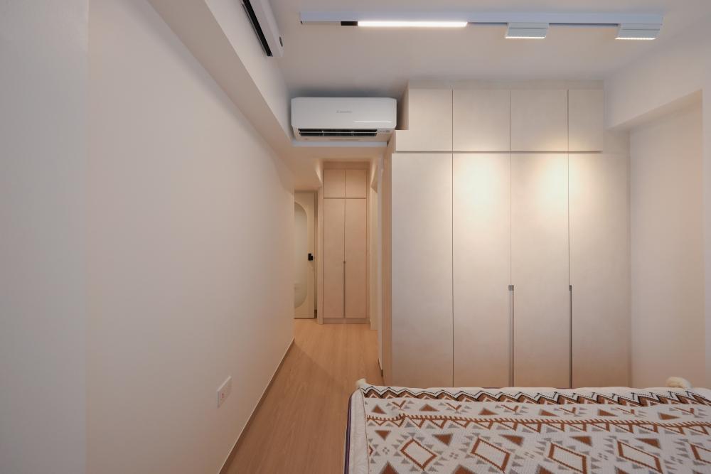 Minimalist Bedroom with Cove Lighting and Wardrobe
