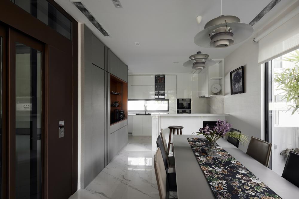 Asian Dining Room with Ceiling Light and Dining Table