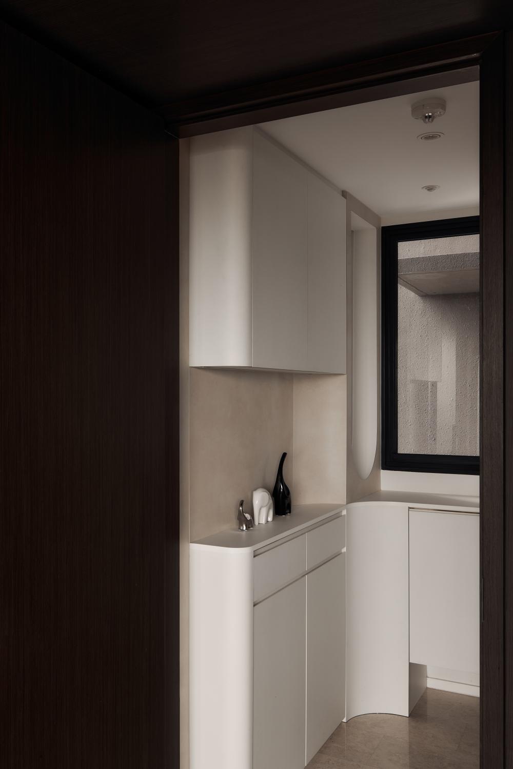Modern Hallway with Storage Cabinets and Small Storage