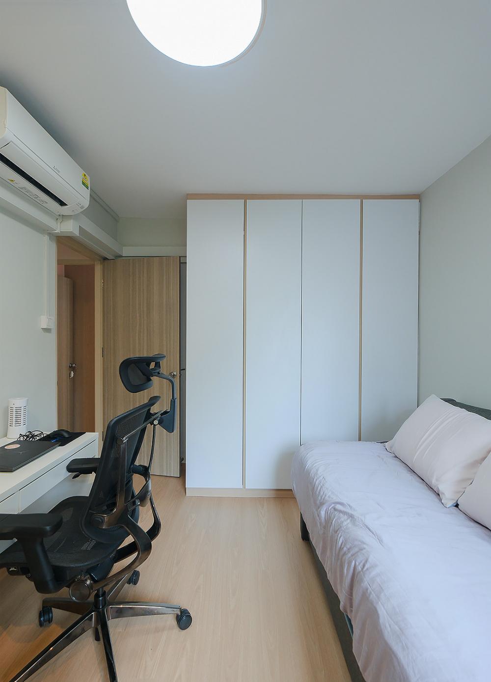 Scandinavian Bedroom with Wood Flooring and Drop Ceiling