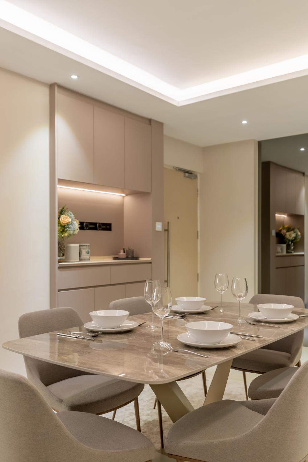 Contemporary Restaurant with Cove Lighting and Dining Table