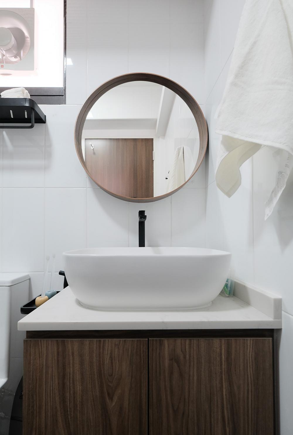 Scandinavian Bathroom with Mirror and Laundry Baskets