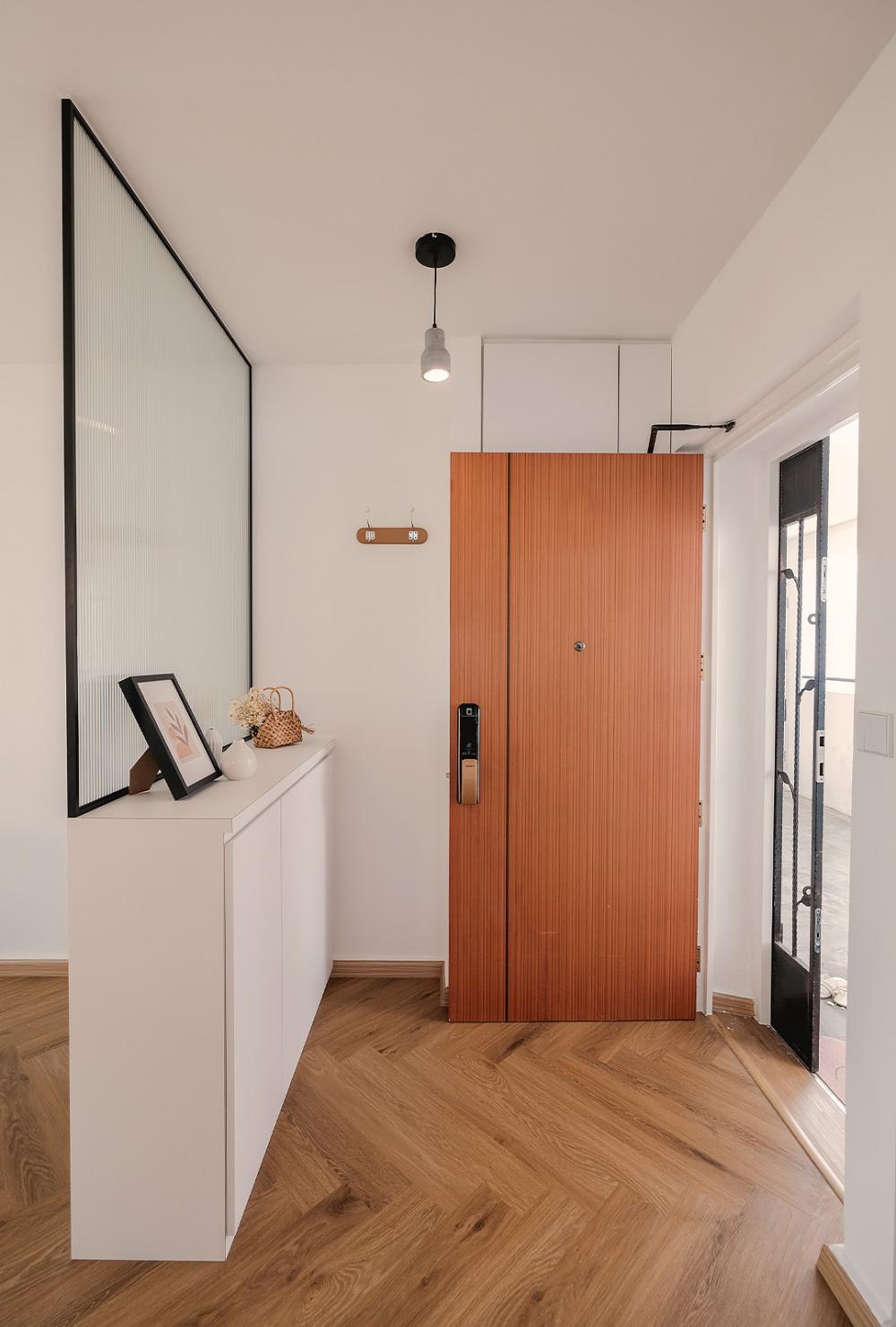 Minimalist Entryway with Mirror and Shoe Rack
