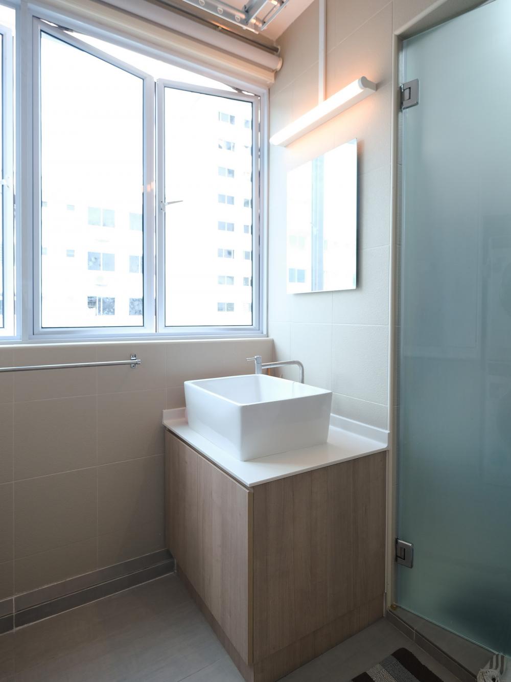 Scandinavian Bathroom with Mirror and Laundry Baskets