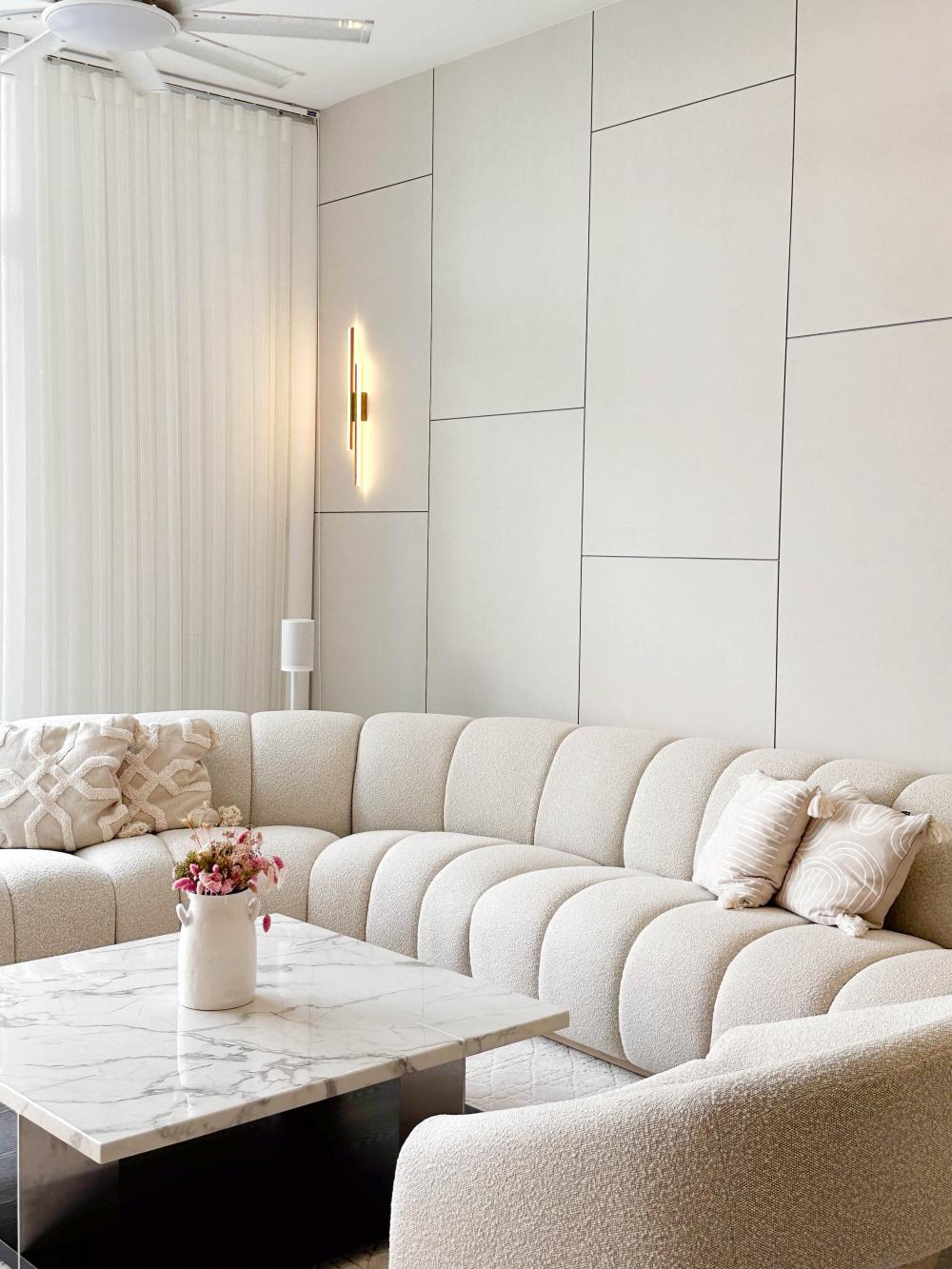 Modern Living Room with Sofa and Paintings