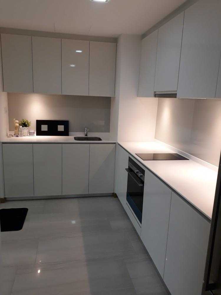 Minimalist Kitchen with Countertop and Homogeneous Tiles