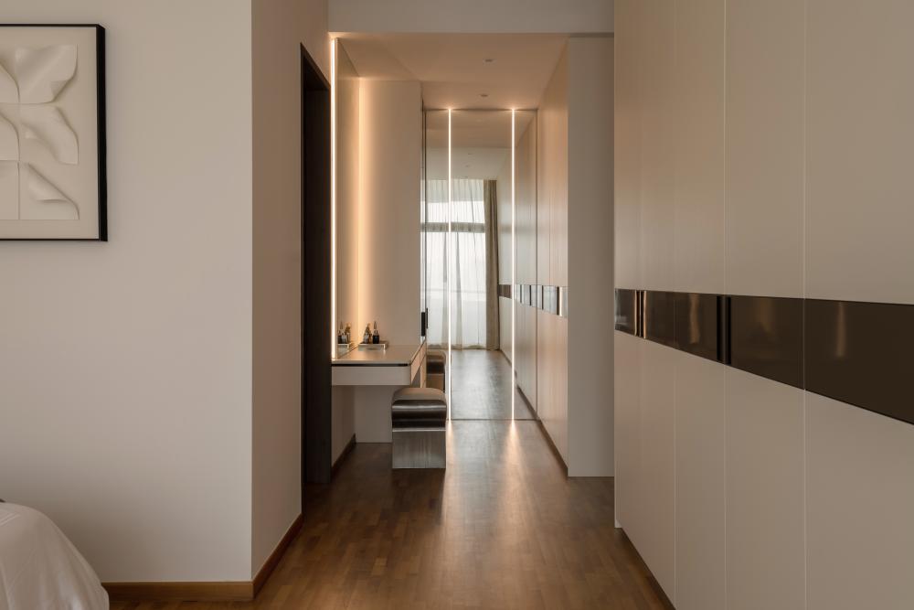 Contemporary Walk-in Wardrobe with Cove Lighting and Seating Bench