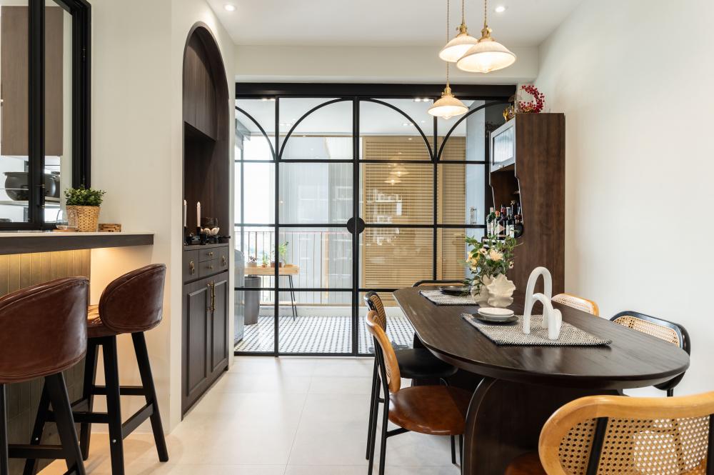 Modern Dining Room with Drop Light and Glass Door