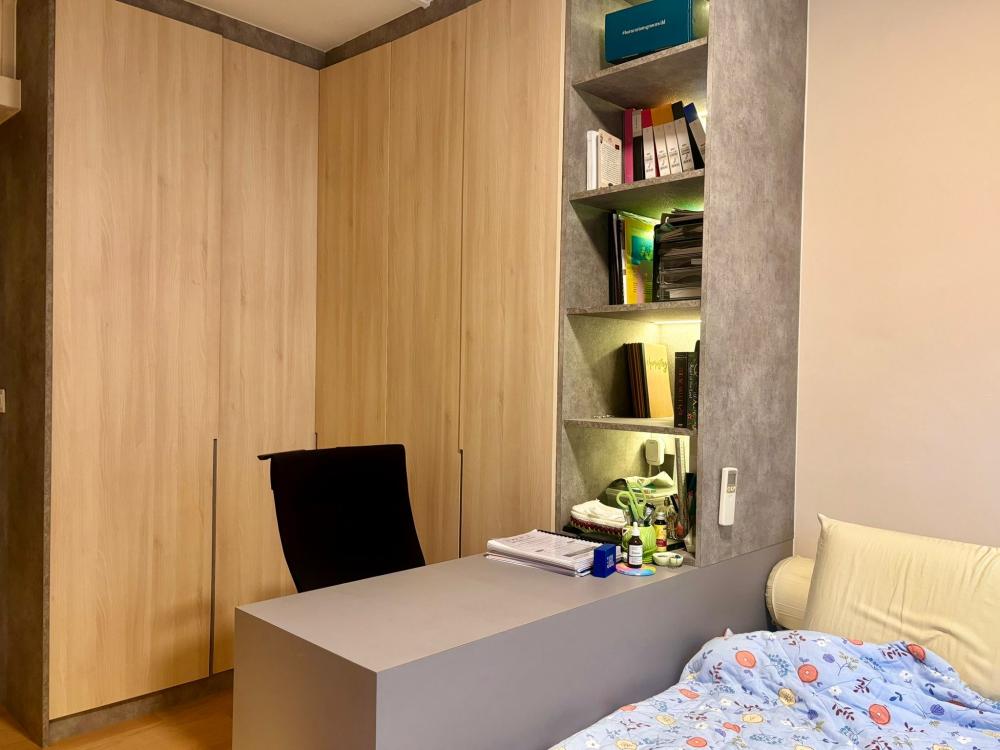 Asian Bedroom with Bookshelf and Platform Bed