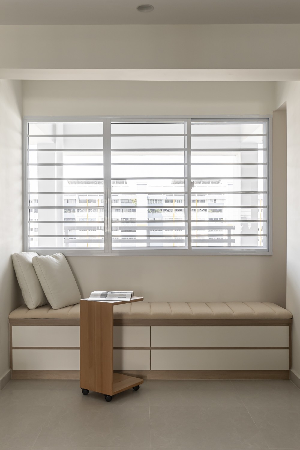 Scandinavian Entryway with Bay Window and Window Seat