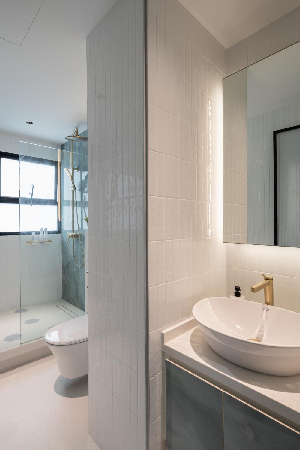 Modern Bathroom with Herringbone Tiling and Wood Flooring