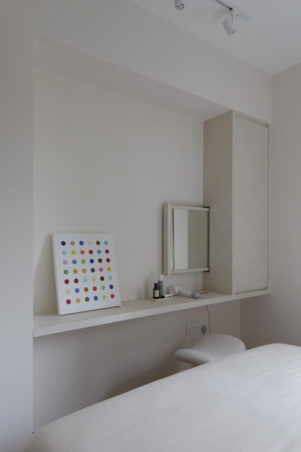 Scandinavian Bedroom with Bookshelf and Queen Bed