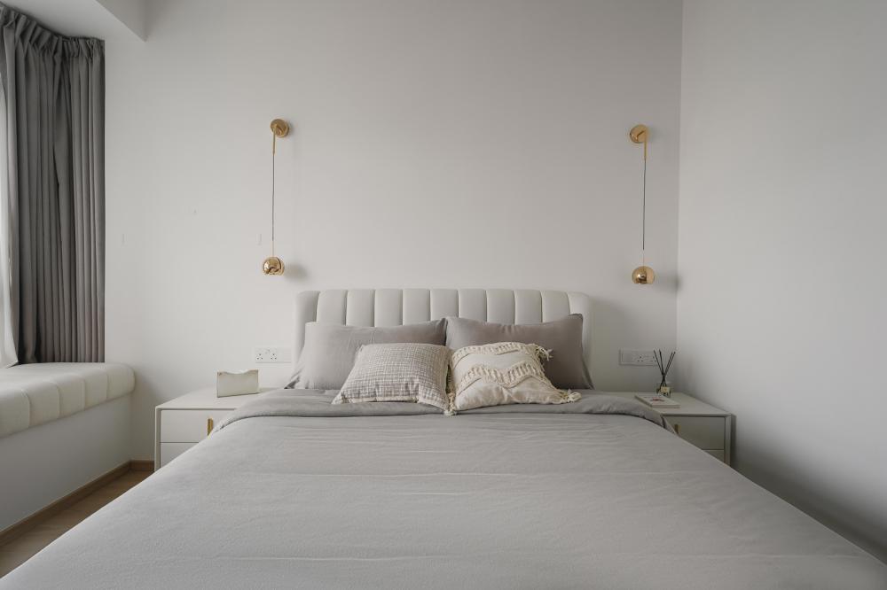 Minimalist Bedroom with Bay Window and Bedside Table