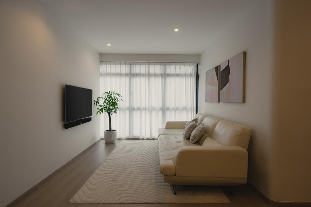 Minimalist Living Room with Vinyl Flooring and Feature Wall