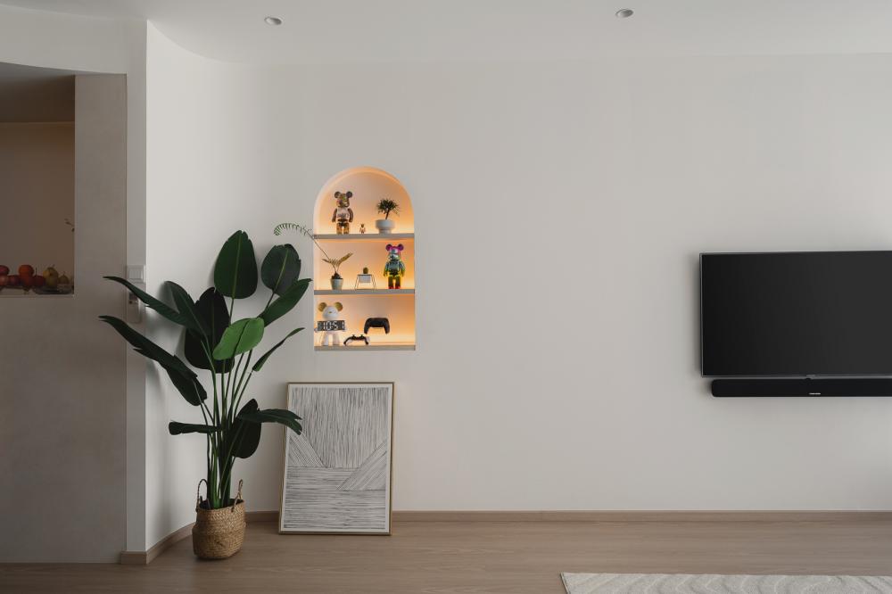 Minimalist Living Room with Bookshelf and Feature Wall