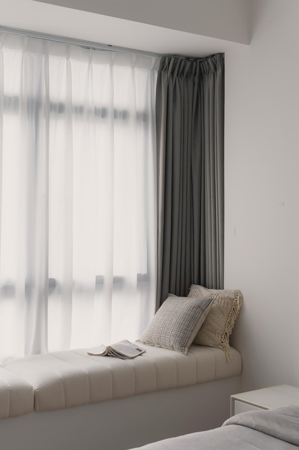 Minimalist Bedroom with Bay Window and Bedside Table
