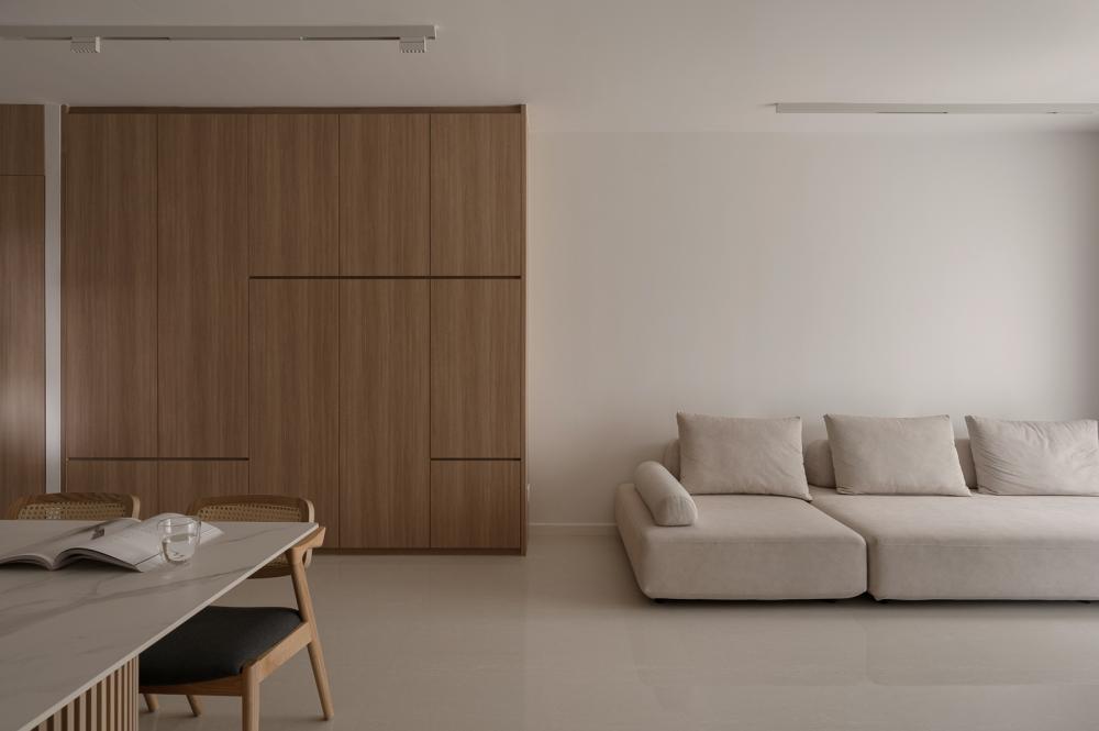 Scandinavian Living Room with Sofa and Paintings