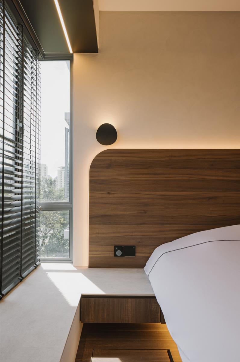 Modern Bedroom with Bay Window and Bedside Table